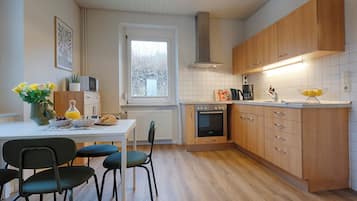Classic Apartment, Partial Lake View | Private kitchen | Fridge, oven, stovetop, electric kettle