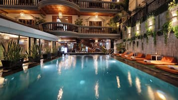 Outdoor pool, open 9:00 AM to 9:00 PM, free cabanas, pool umbrellas