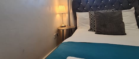 2 bedrooms, blackout curtains, iron/ironing board, free WiFi