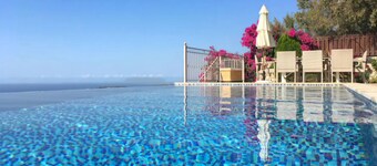 Villa Ionion Pelagos, infinity pool with magnificent 180° view of sea & mountain