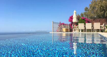 Villa Ionion Pelagos, infinity pool with magnificent 180° view of sea & mountain