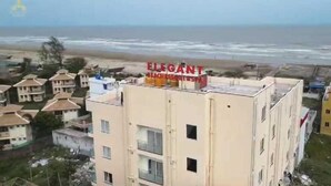 A building with a sign reading "ELEGANT BEACH RESORT & SPA" on the rooftop. - Elegant Beach Resort (Kanthi)