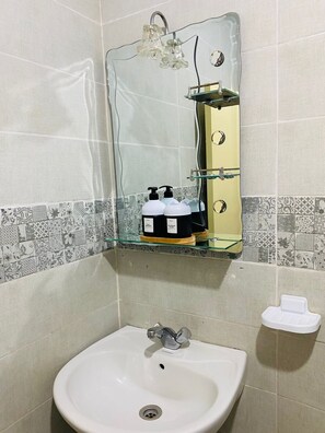 Hair dryer, towels, soap, toilet paper