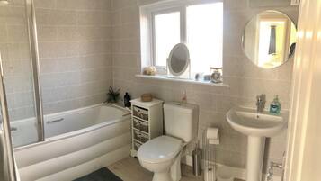 Hair dryer, towels, soap, shampoo