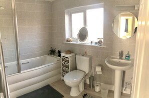 Hair dryer, towels, soap, shampoo