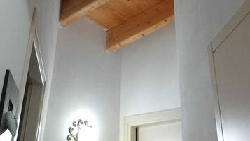 Quadruple Room, Balcony, Mountain View | Living area | 26-inch LED TV with digital channels