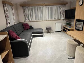 Cabaña | Área de sala de estar | Chimenea 