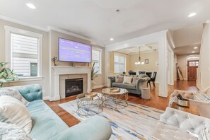 Smart TV, fireplace, DVD player, books