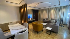 Luxury Apartment, Balcony, City View | Living area | Flat-screen TV - Tobas Apartment (Uyo)