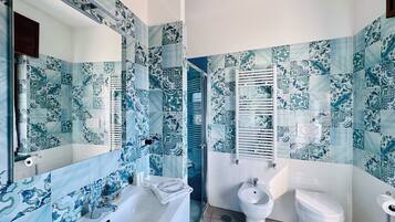 Superior Double Room, City View | Bathroom | Shower, hair dryer, towels, soap