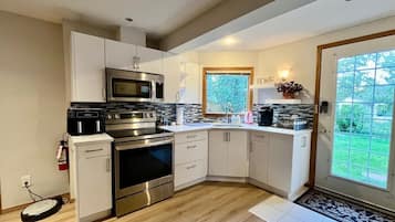 Fridge, microwave, stovetop, coffee/tea maker