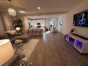 Smart TV, fireplace, books, stereo