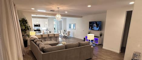 Smart TV, fireplace, books, stereo