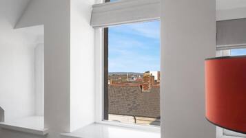 Comfort Apartment, 2 Bedrooms, City View | In-room safe, desk, laptop workspace, iron/ironing board