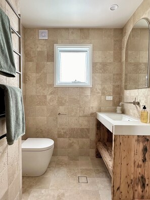 Shower, eco-friendly toiletries, hair dryer, towels