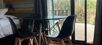 Cozy studio BRISA in La Pedrera with AC, WiFi, front deck on a garden