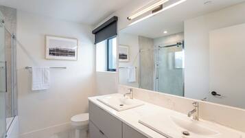 Comfort Condo, Balcony, Mountain View | Bathroom | Combined shower/tub, free toiletries, towels, soap