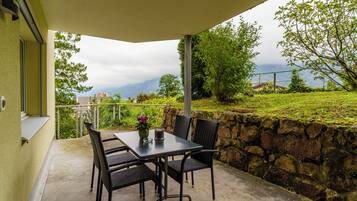 Basic-Apartment, Seeblick | Blick auf den Garten