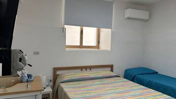 Standard Room | Minibar, blackout drapes, iron/ironing board, free WiFi