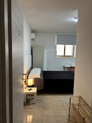 Room | Minibar, blackout drapes, iron/ironing board, free WiFi