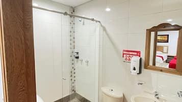 Triple Room | Bathroom | Shower, towels, soap, toilet paper