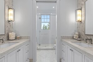 Shower, bidet, towels - Welcome to The CDA Lakehouse at Pugh Point that offers tranquil luxury. (Harrison)