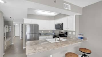 Condo, 1 Queen Bed with Sofa bed (Four Winds 103) | Private kitchen | Oven