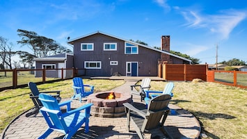 Huge fenced yard with firepit