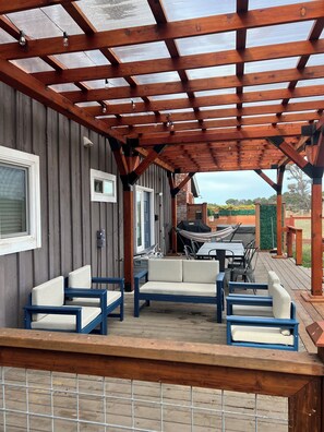Outdoor dining - Updated 5BR ocean view villa in Mendocino - Fort Bragg with firepit & hot tub (Fort Bragg)