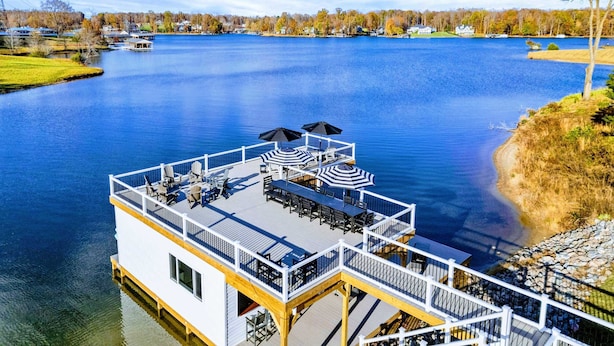 A waterfront boat with outdoor seating and a deck. - Lakefront Lake Anna, Pool, Beach, Dock (Mineral)