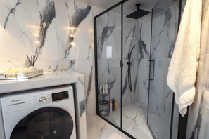 Hair dryer, towels, soap, shampoo