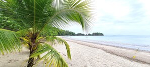 On the beach, sun-loungers, beach towels