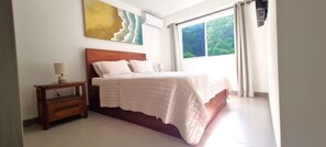 2 bedrooms, desk, iron/ironing board, free WiFi - Beachfront condo - 16th floor whith stunning forest view.  Steps to the beach. (Puntarenas, Garabito)