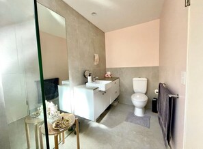Hair dryer, towels, soap, toilet paper