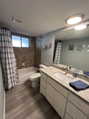 Shower, towels, toilet paper