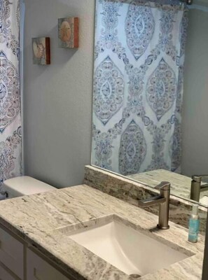 Shower, towels, soap, shampoo