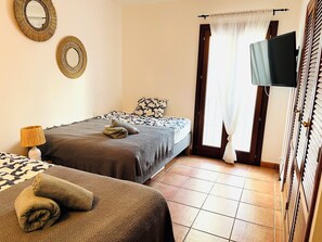 2 bedrooms, in-room safe, iron/ironing board, travel cot