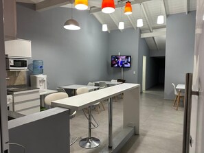 Deluxe Double or Twin Room, Garden View | Living area | 43-inch flat-screen TV with cable channels, printers