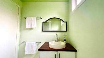 Hair dryer, towels, soap, shampoo