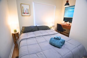 1 bedroom, desk, iron/ironing board, travel crib