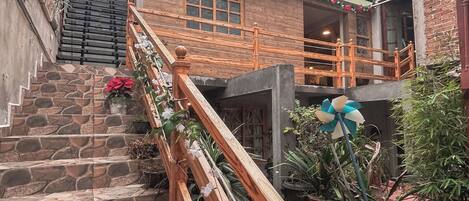 Familie appartement, uitzicht op tuin | Terras