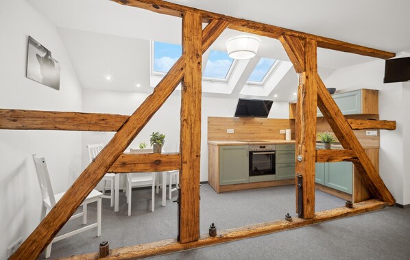 Fridge, stovetop, dishwasher, coffee/tea maker