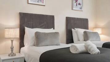 2 quartos, ferros/tábuas de passar roupa, Wi-Fi de cortesia