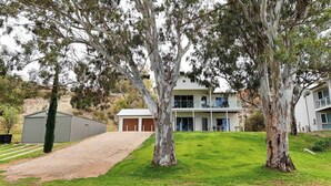 A two-story house with a large front lawn, a garage, and a shed. - TWIN GUMS - EXCLUSIVE RIVERFRONT PROPERTY - TAILEM BEND (Tailem Bend)