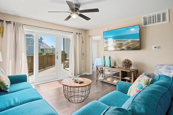 Téléviseur, table de baby-foot, table de ping-pong, livres