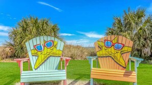 Two beach chairs with starfish designs. - Ocean Lakes 1076 (Myrtle Beach)