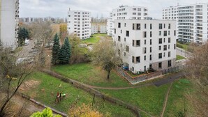 A residential area with modern apartment buildings, a playground, and a park. - Targówek Homely Apartment (Warszawa)