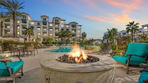 A resort with a pool, outdoor seating, and a fire pit. - Stay longer, Spend Less, 2 Master Suites! The Cays (Chandler)