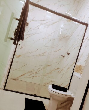 Shower, hair dryer, towels, soap