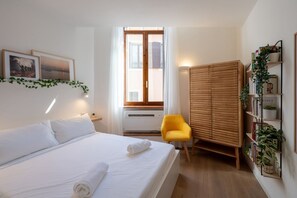 1 slaapkamer, een strijkplank/strijkijzer, wifi, beddengoed
